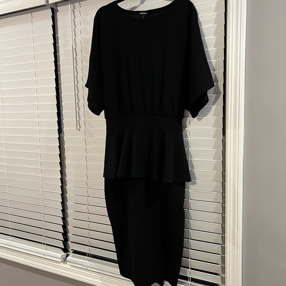 Boat neck peplum dress